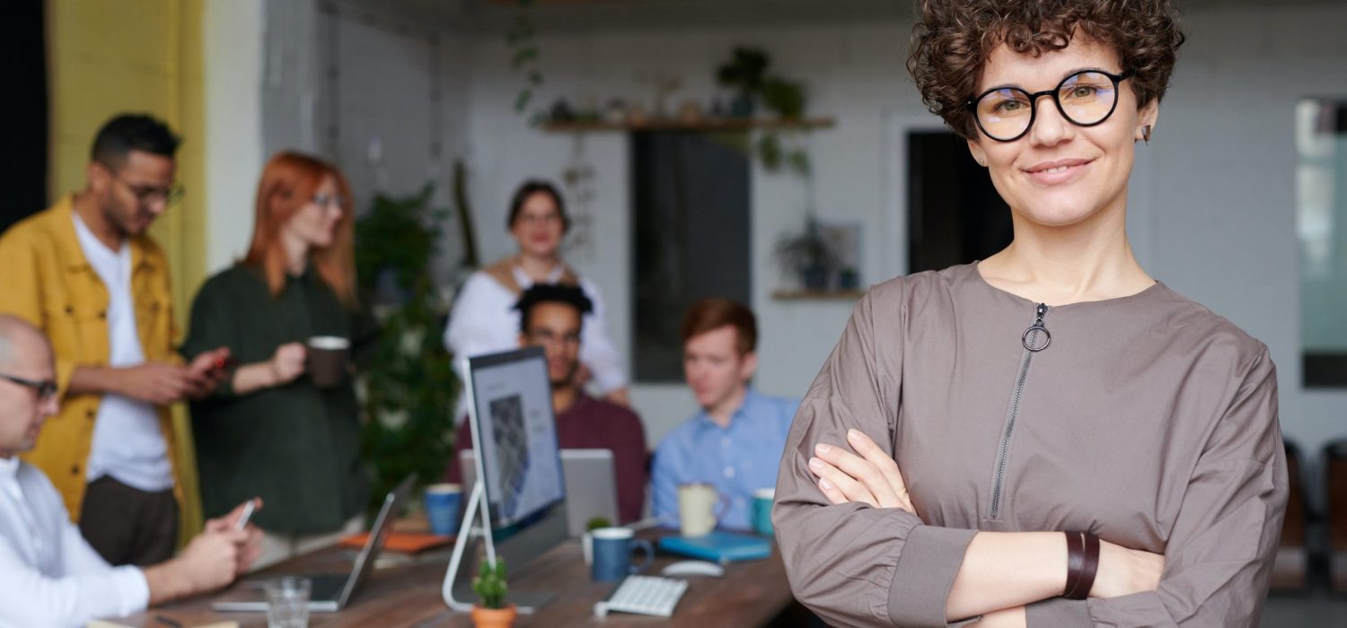 Business Owner and Employees Discussing Retirement Plans