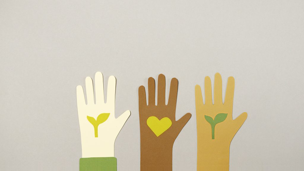 Cartoon hands with different skin tones, rising up for ESG causes